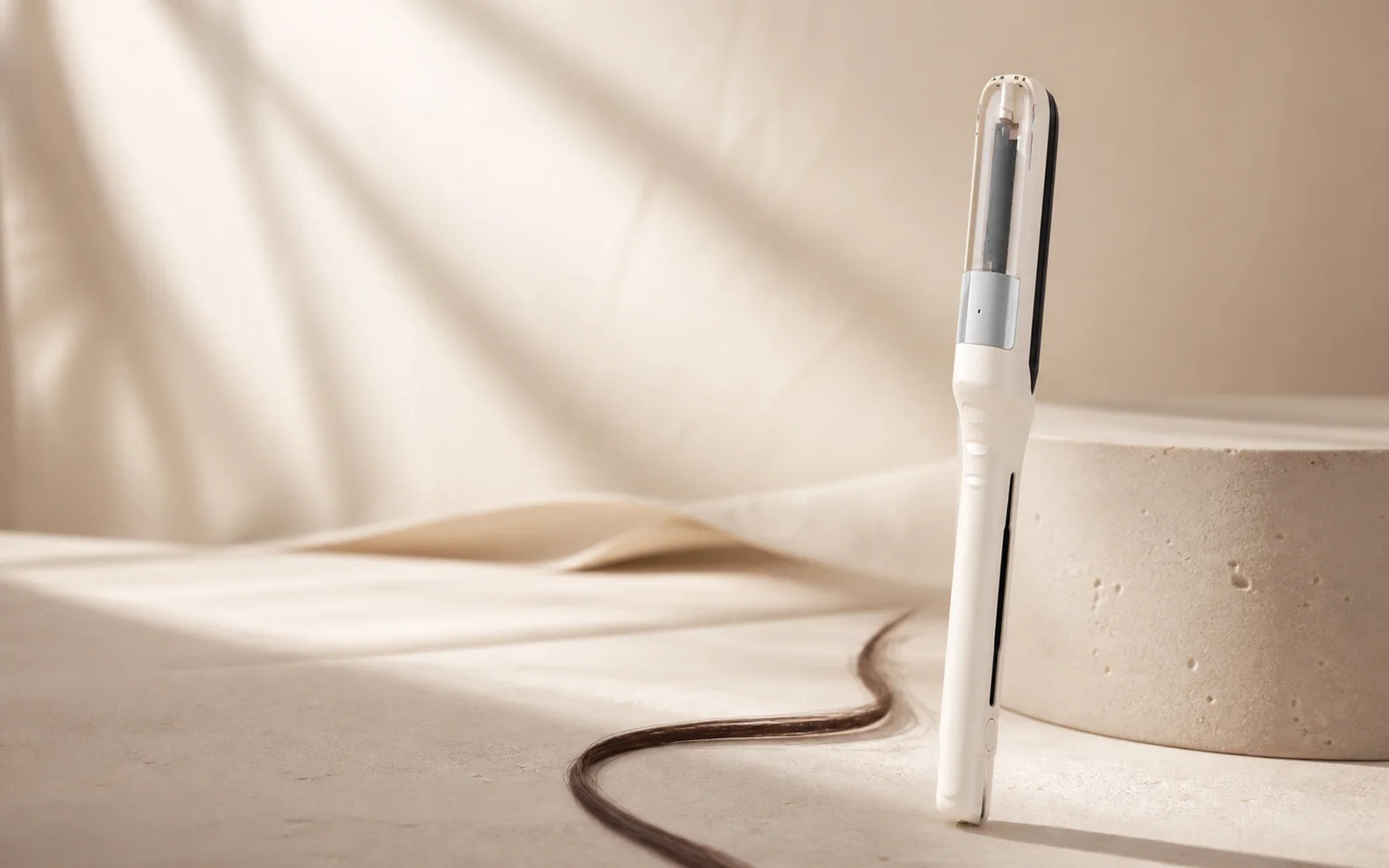 The Ends Method beige hair-ends trimmer on a warm ivory vanity